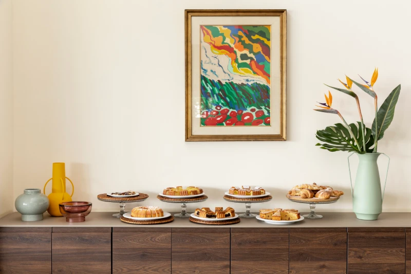 Sweet buffet with croissants and cakes on stands, perfect for breakfast before exploring Liguria - Hotel Al Sant'Andrea, BZAR hotels in Liguria