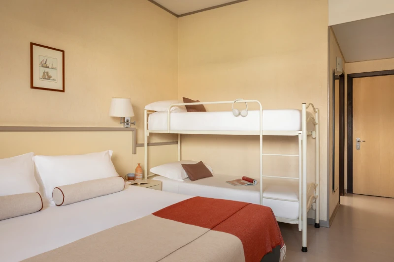 Family room with double bed and bunk bed, practical layout for families staying in Sarzana, Liguria - Hotel Al Sant'Andrea, BZAR hotels in Liguria