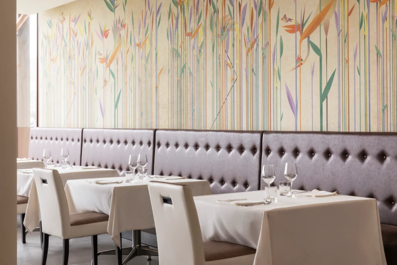 Elegant restaurant dining room with set tables, upholstered seating and mural, ideal for a taste-focused Liguria stay - Hotel Al Sant'Andrea, BZAR hotels in Liguria